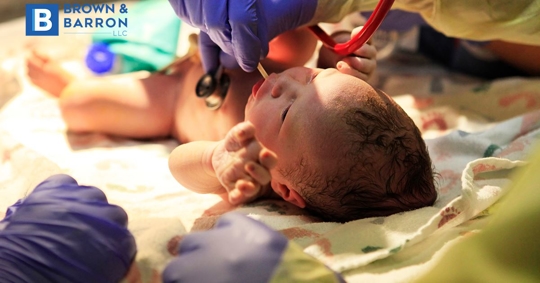 A baby is treated in a hospital