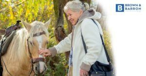 Woman petting a horse
