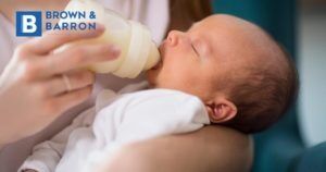 Bottle feeding a baby