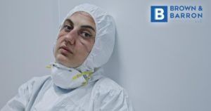 Woman wearing a hazmat suit