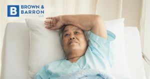 Woman laying in a hospital bed