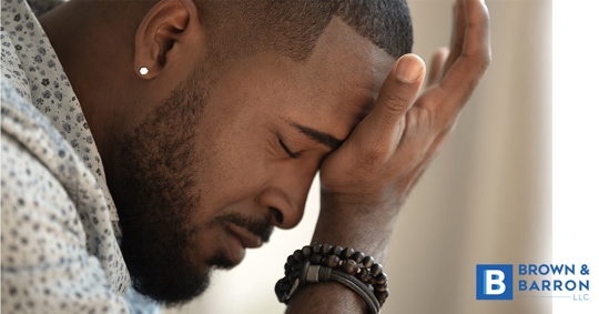 A man is overcome with mental anguish