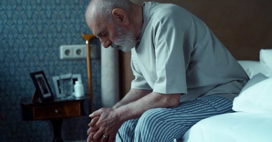 sad man in nursing home